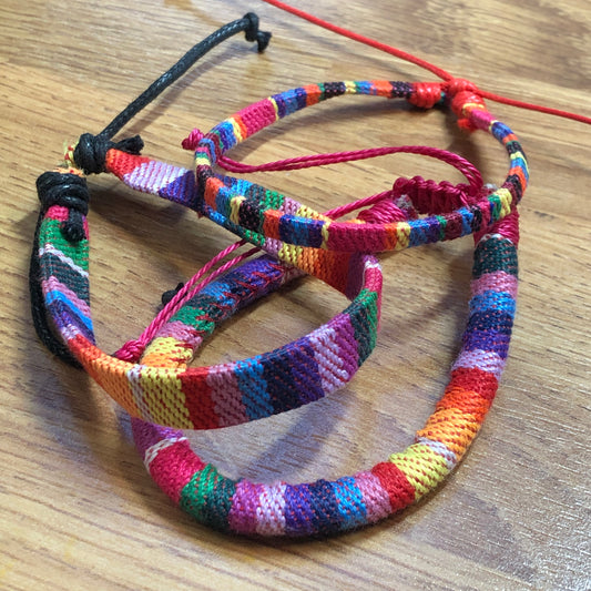 Three rainbow handmade string cord braided woven stackable bracelets