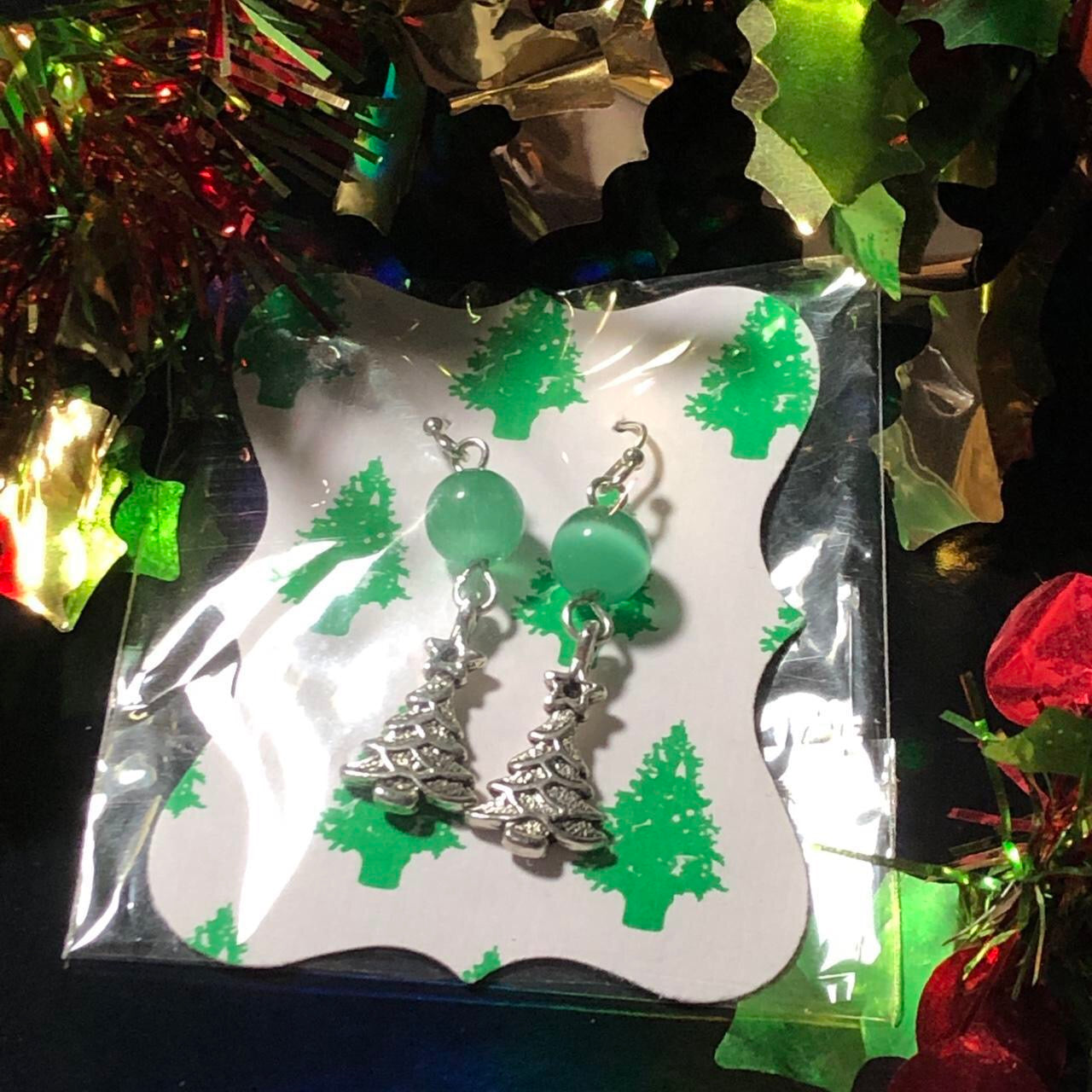 Three pairs Christmas earrings trees and Joy