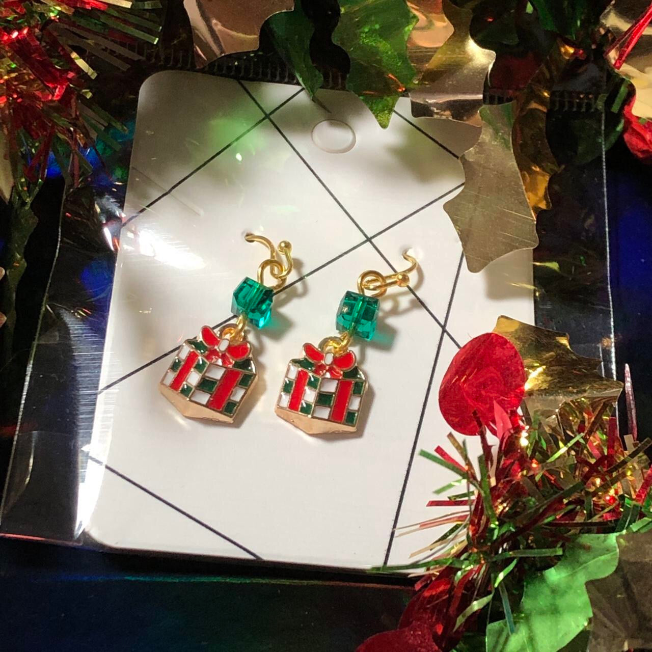 Three pairs Christmas earrings Santas, wreaths and gifts