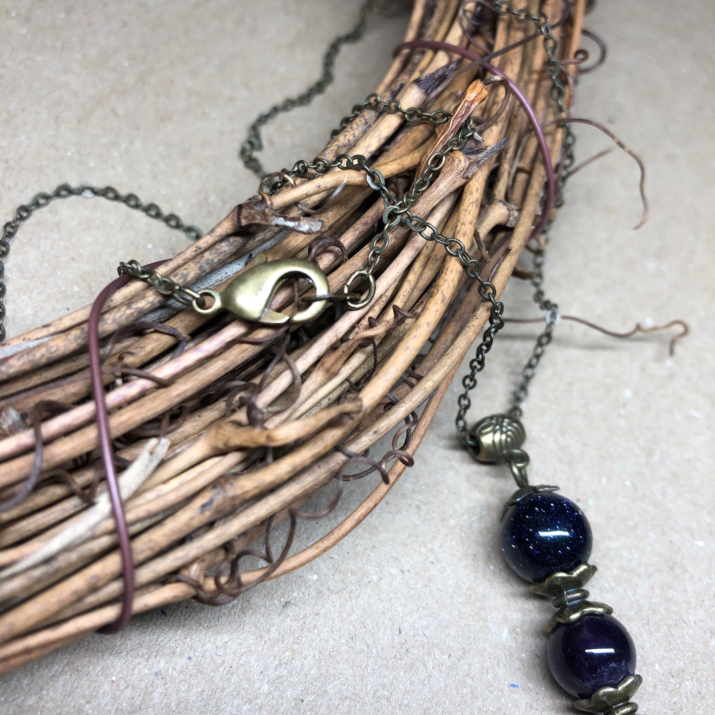 Amethyst and Goldstone pendant necklace