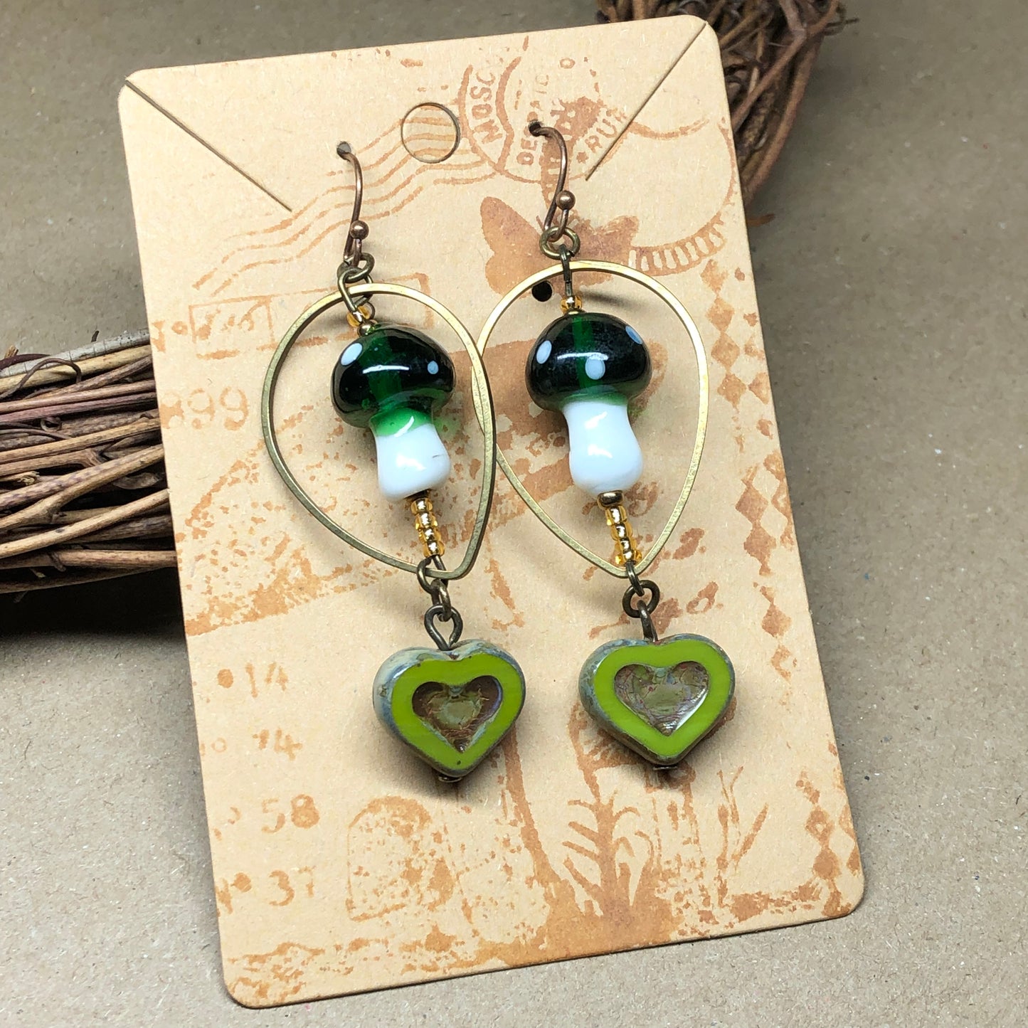 Green and white mushroom heart earrings