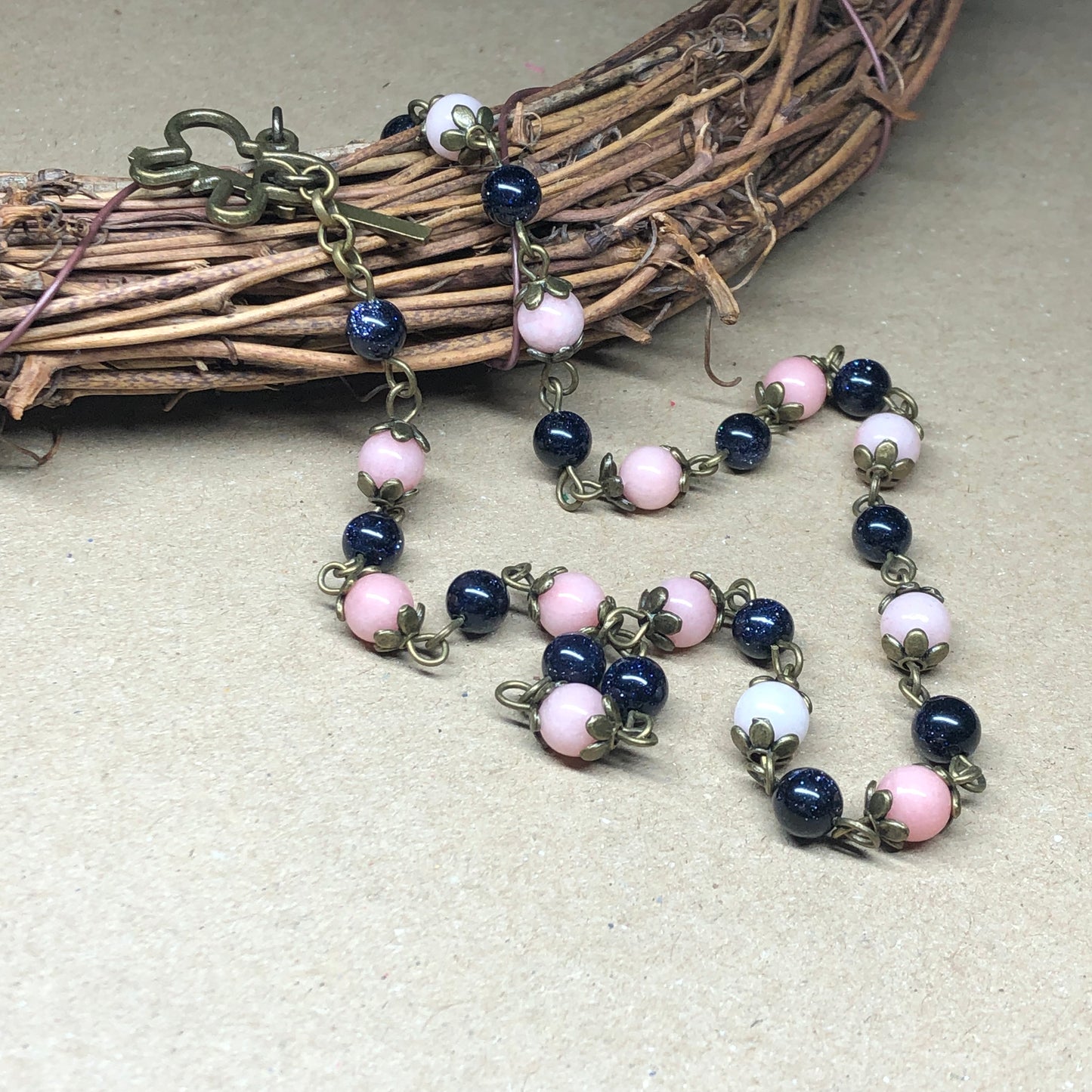 Goldstone and Morganite choker necklace with butterfly toggle