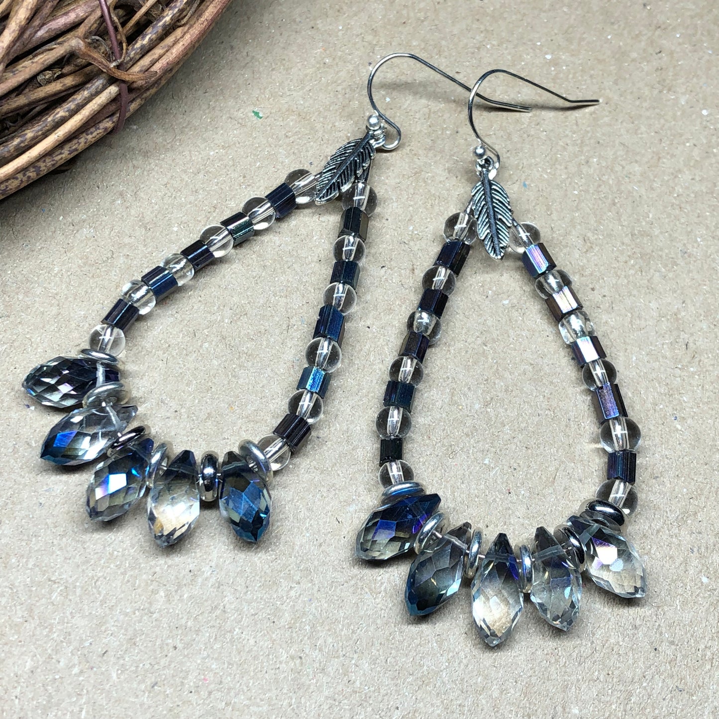 Crystal teardrop hoop earrings with feathers charms