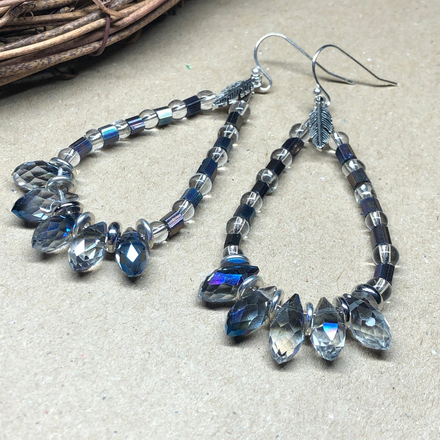 Crystal teardrop hoop earrings with feathers charms