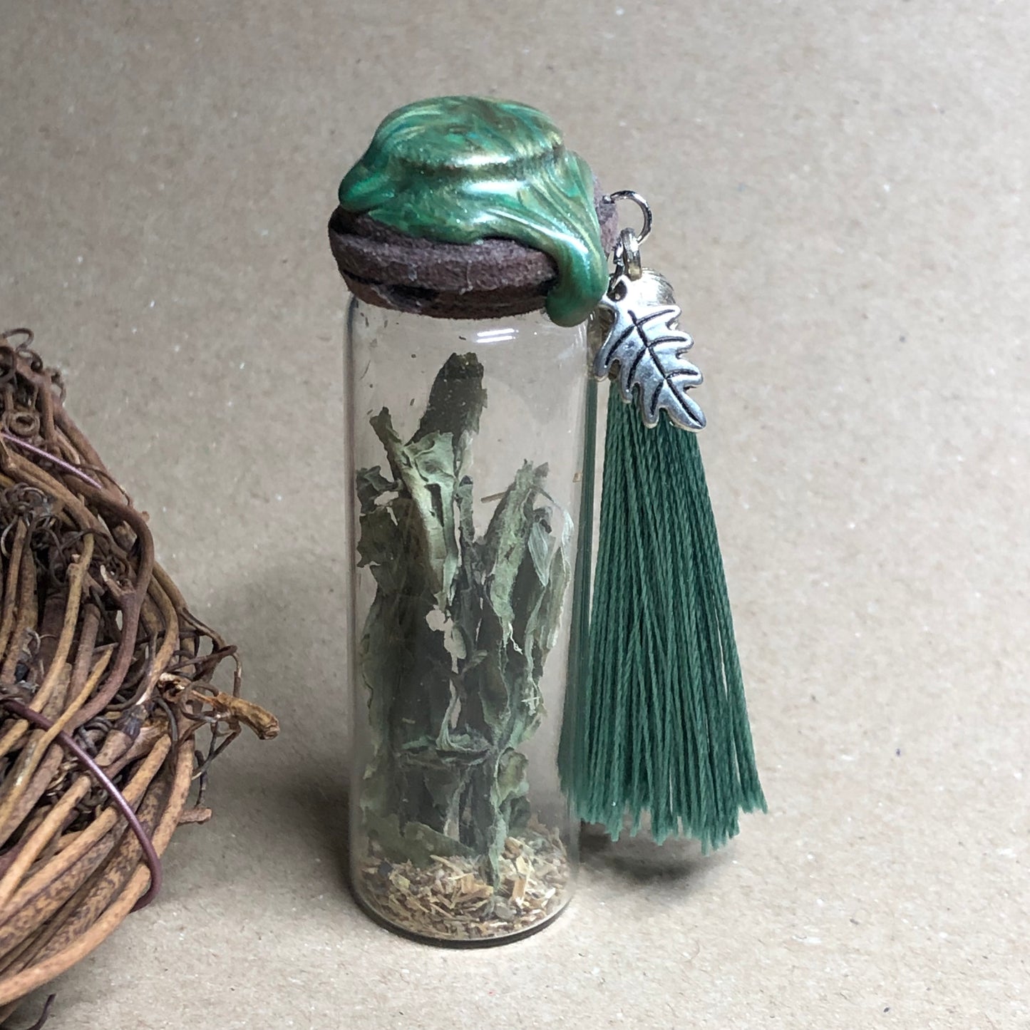 Green decorative apothecary bottle