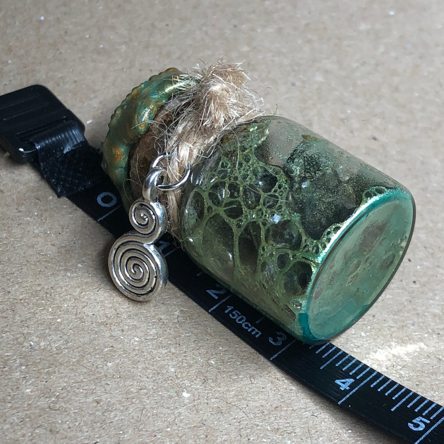 Green swirl decorative apothecary bottle