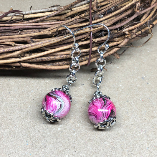 Pink swirl dangle earrings