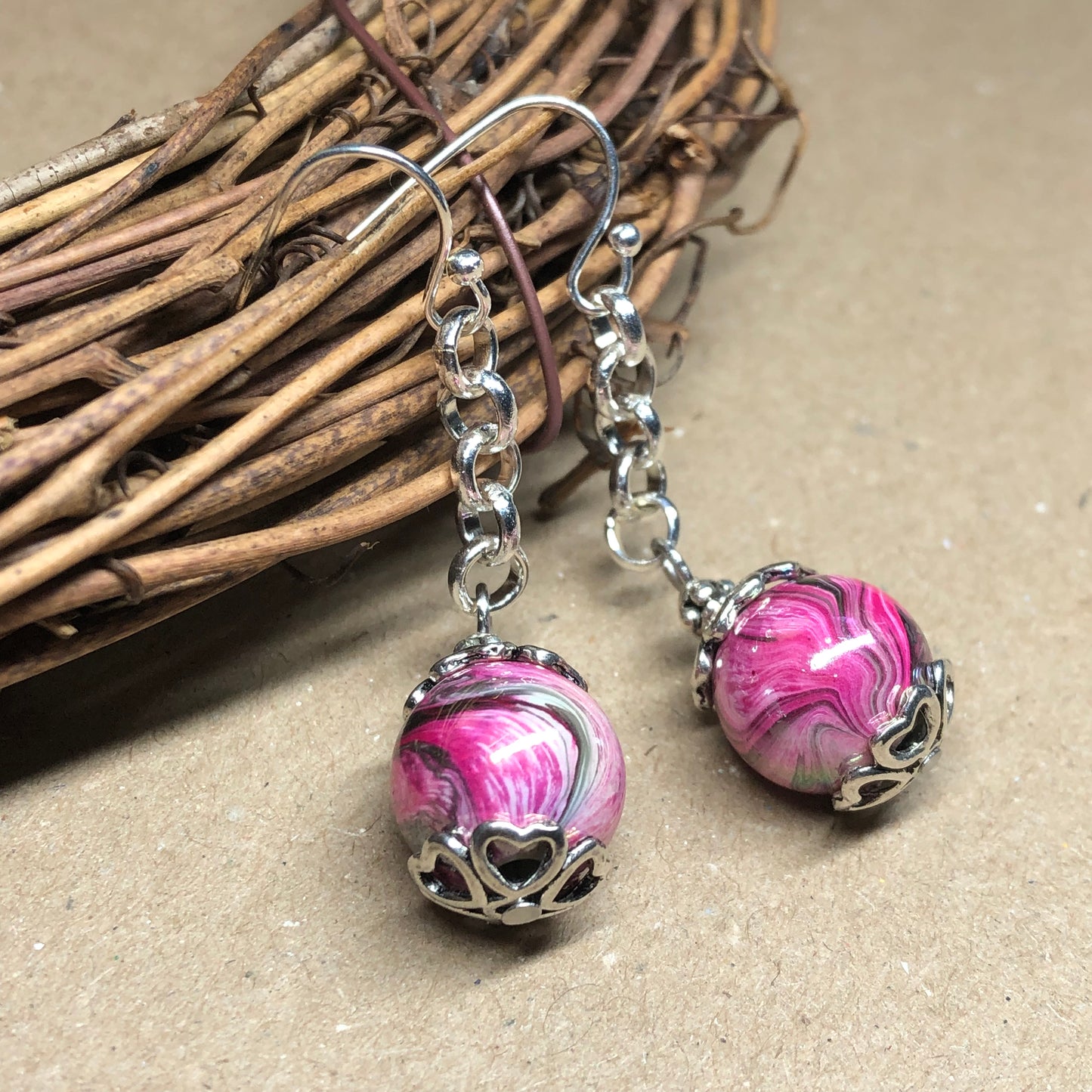 Pink swirl dangle earrings