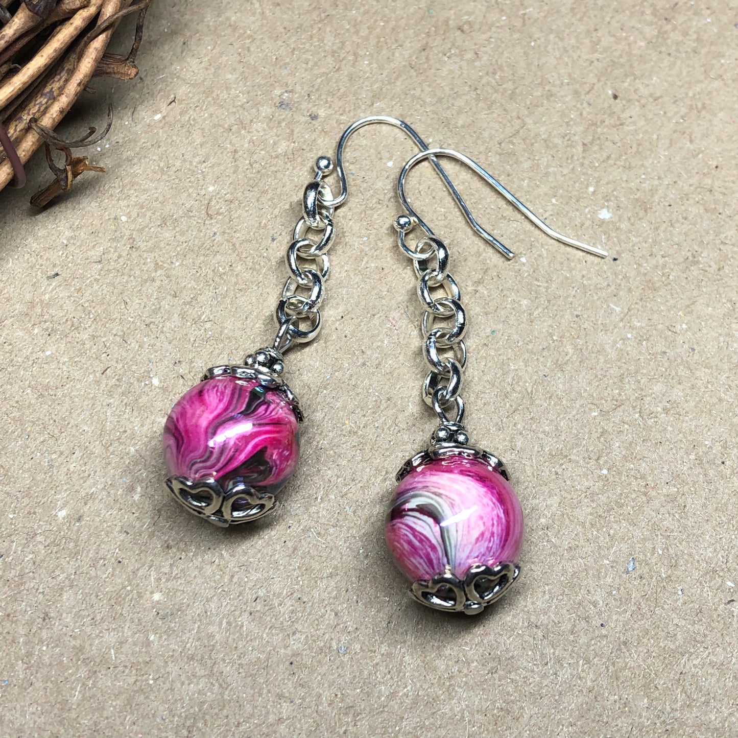 Pink swirl dangle earrings