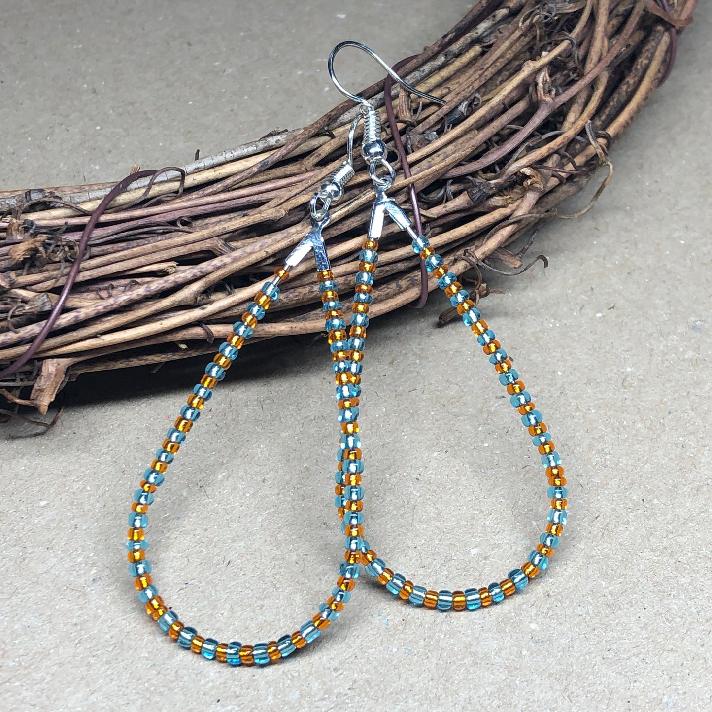 Orange and turquoise teardrop hoop earrings