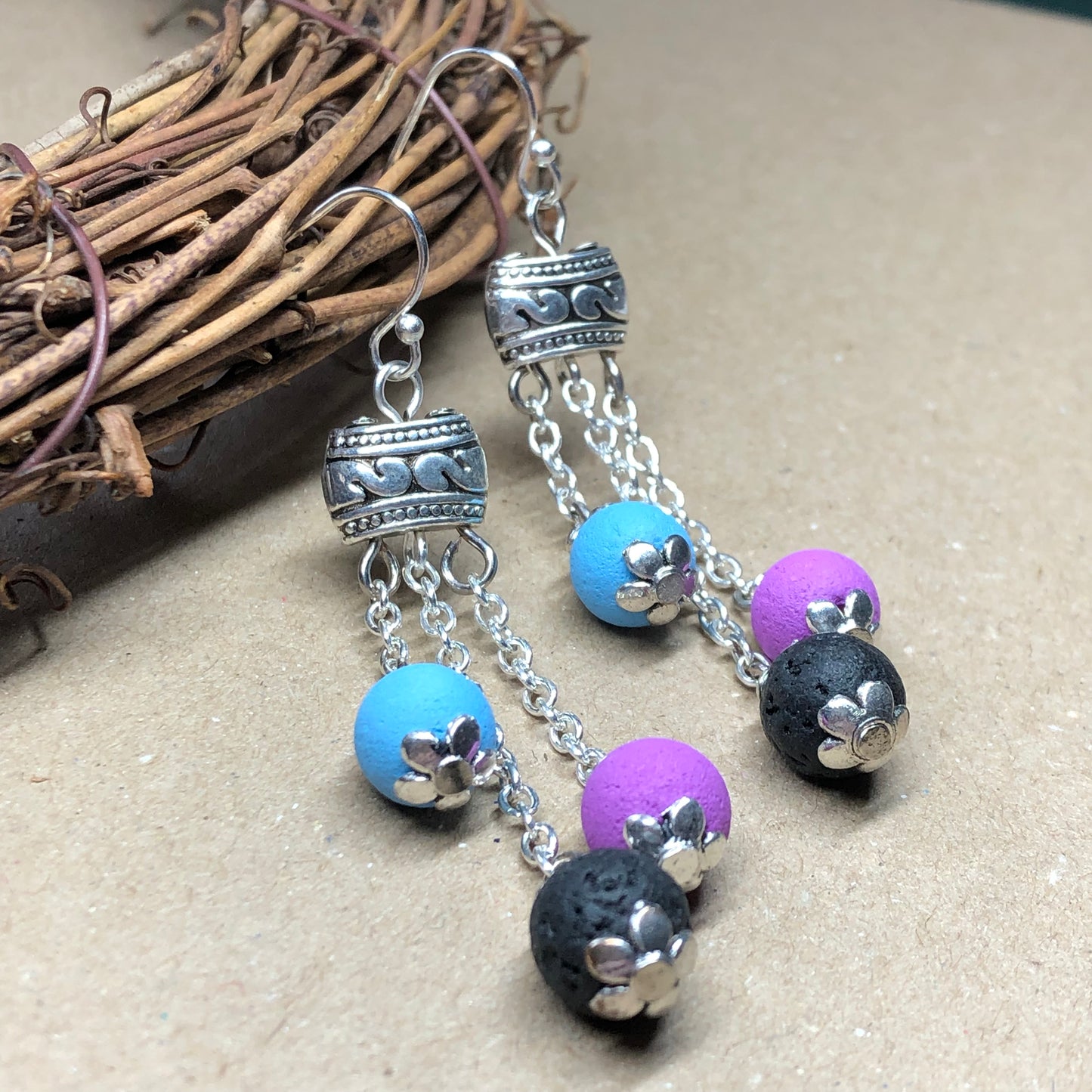 Purple blue and black lava stone earrings