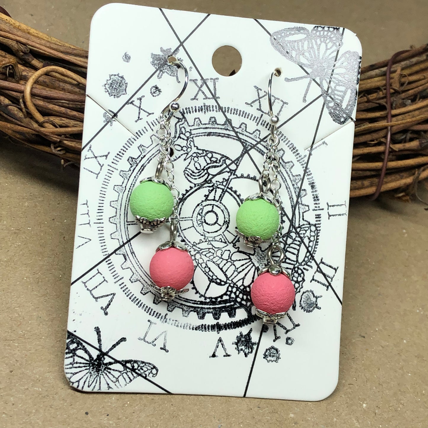 Pink and green lava stone dangle earrings