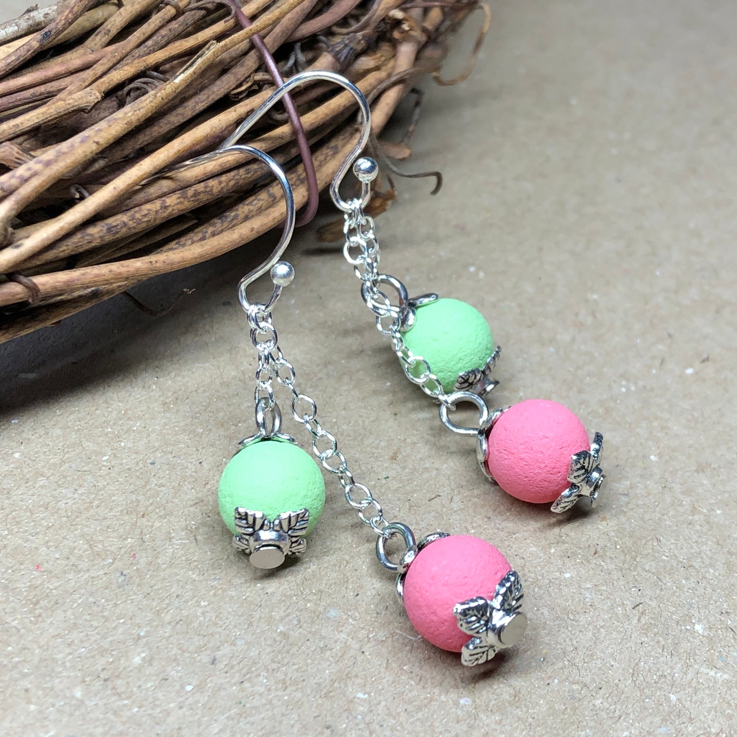 Pink and green lava stone dangle earrings