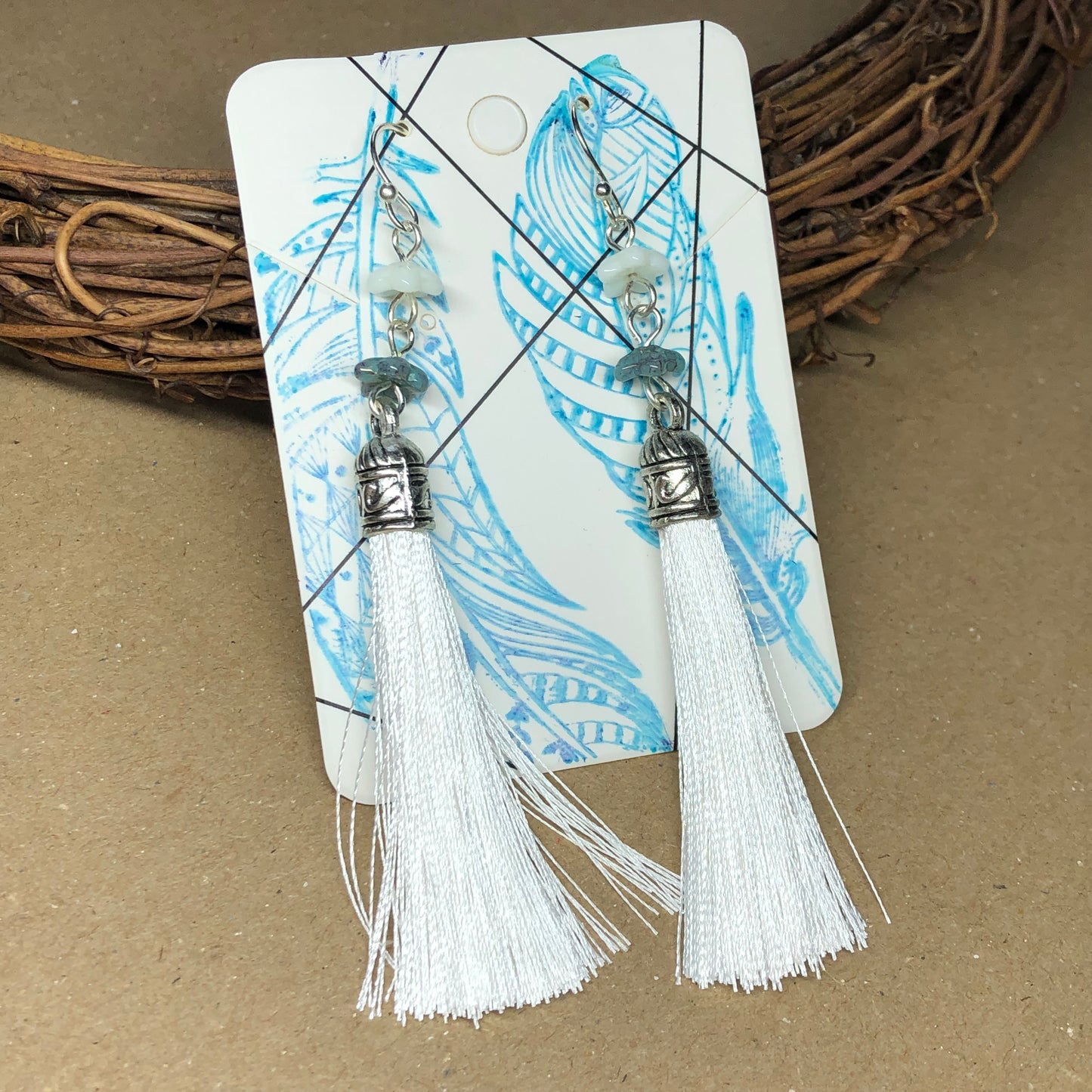 White tassel earrings with flowers