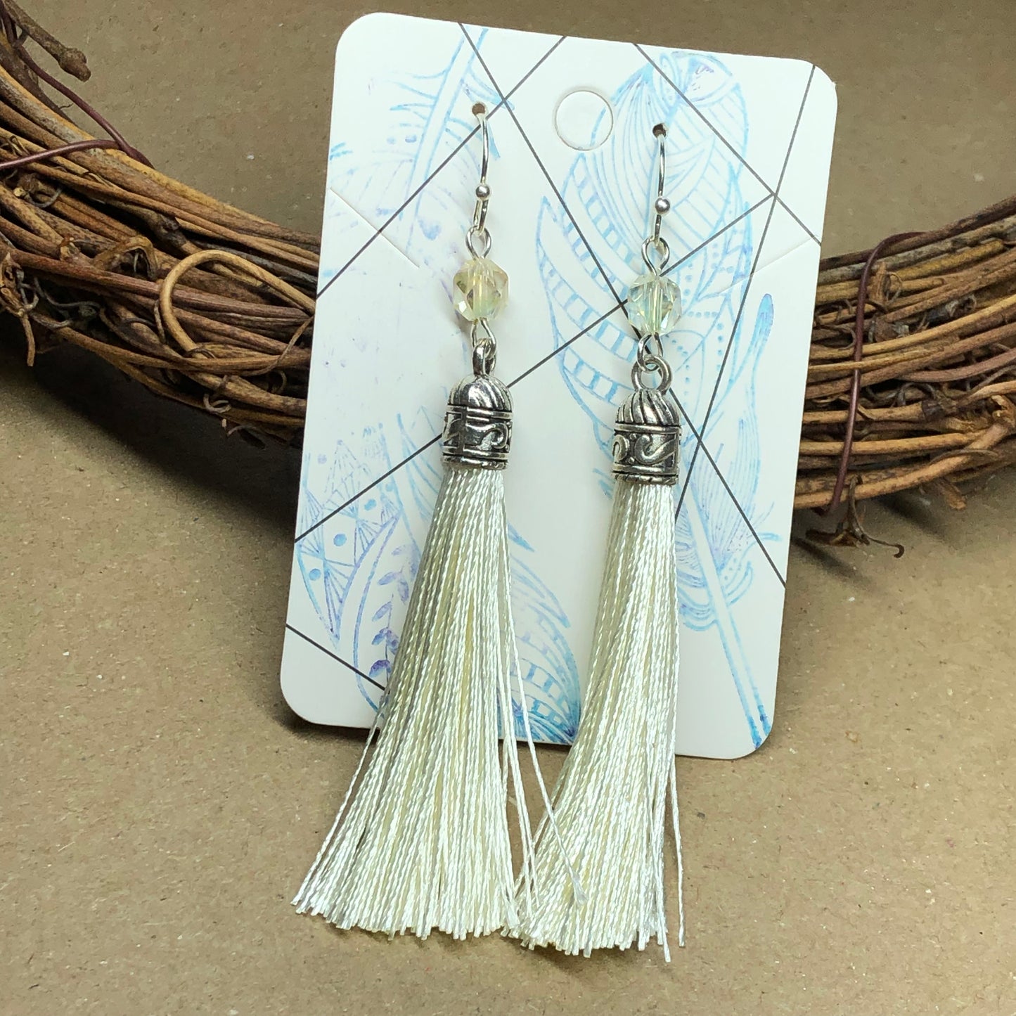 Cream tassel earrings with crystals