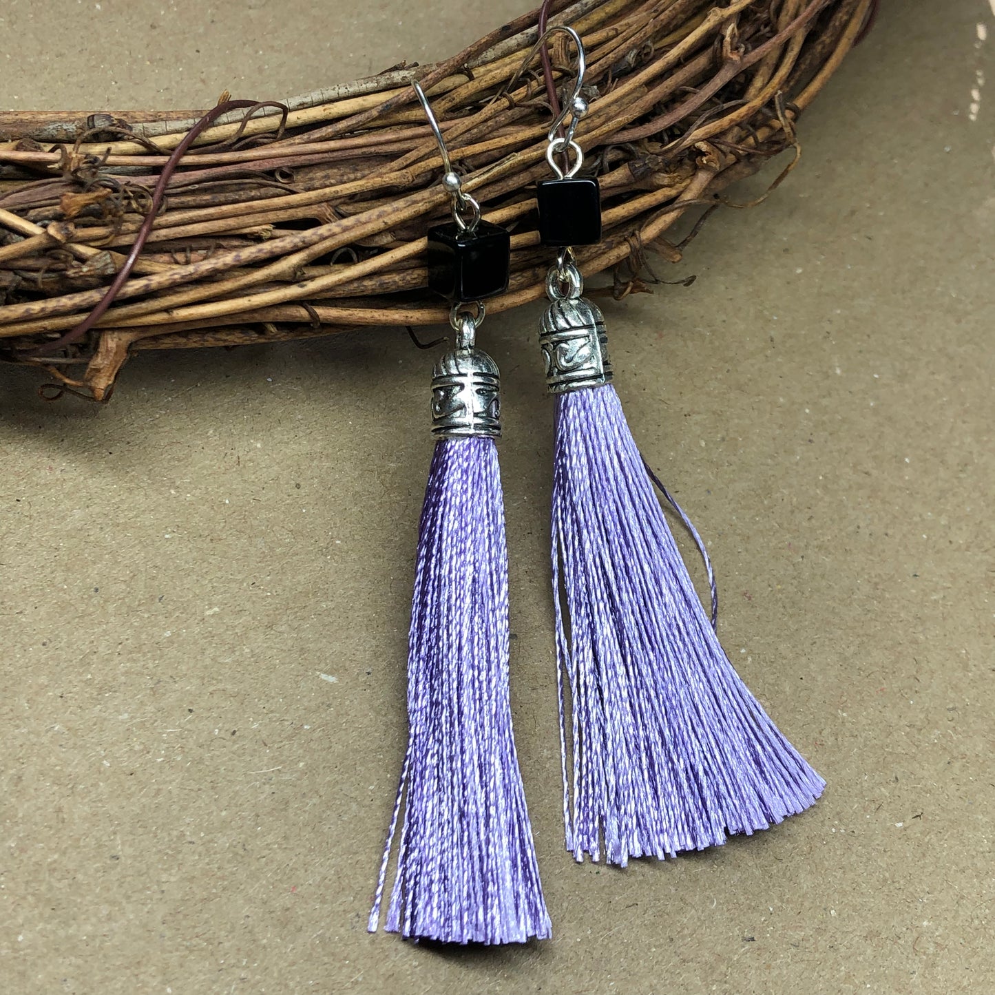 Lilac tassel earrings with black cubes