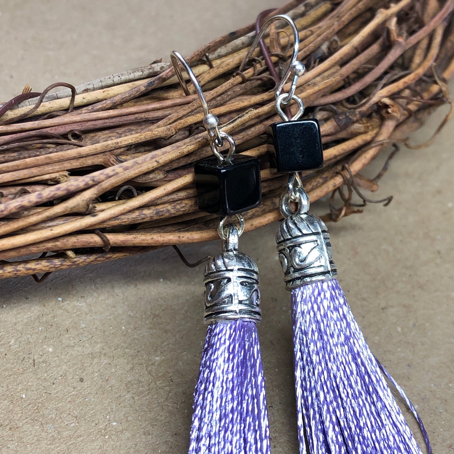 Lilac tassel earrings with black cubes