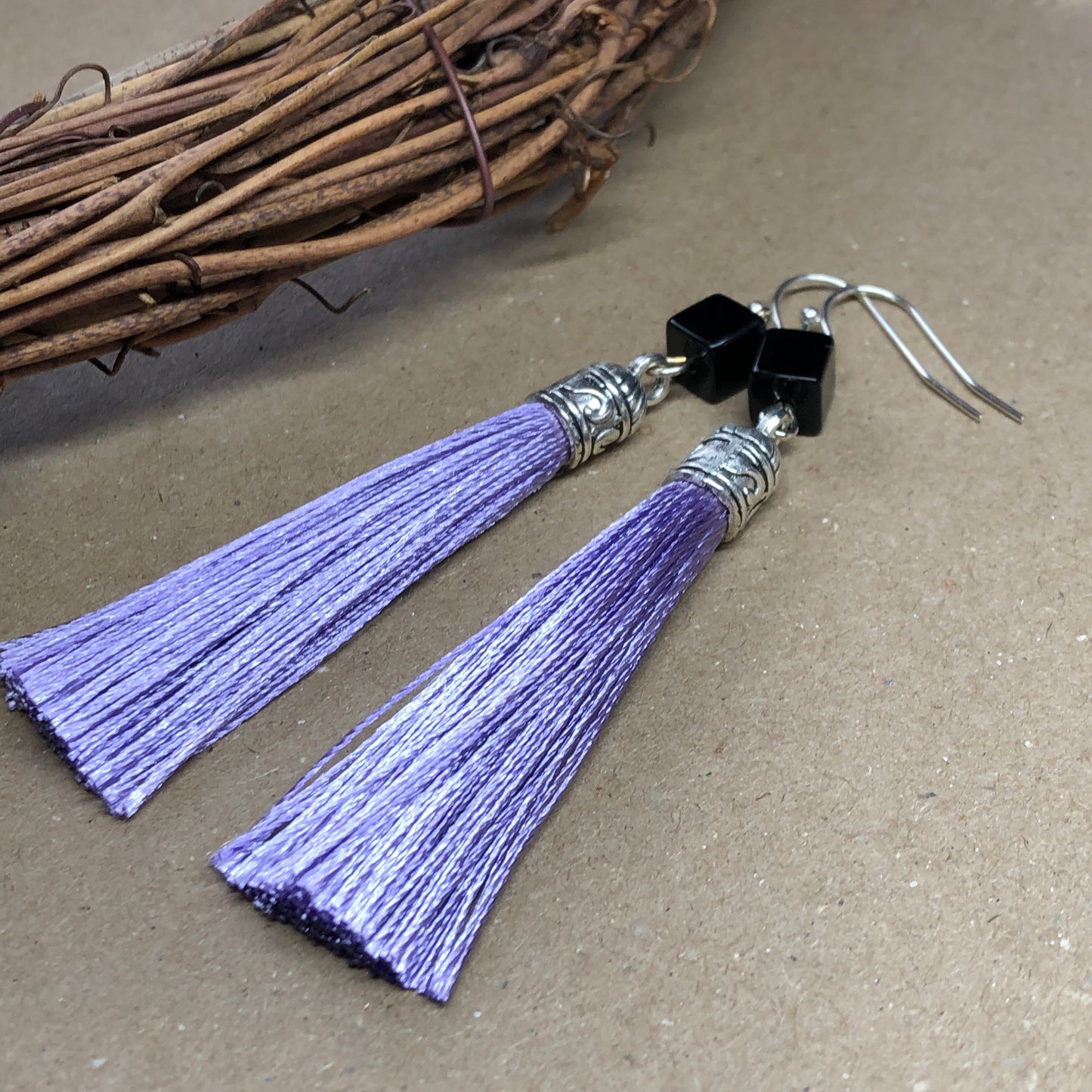 Lilac tassel earrings with black cubes