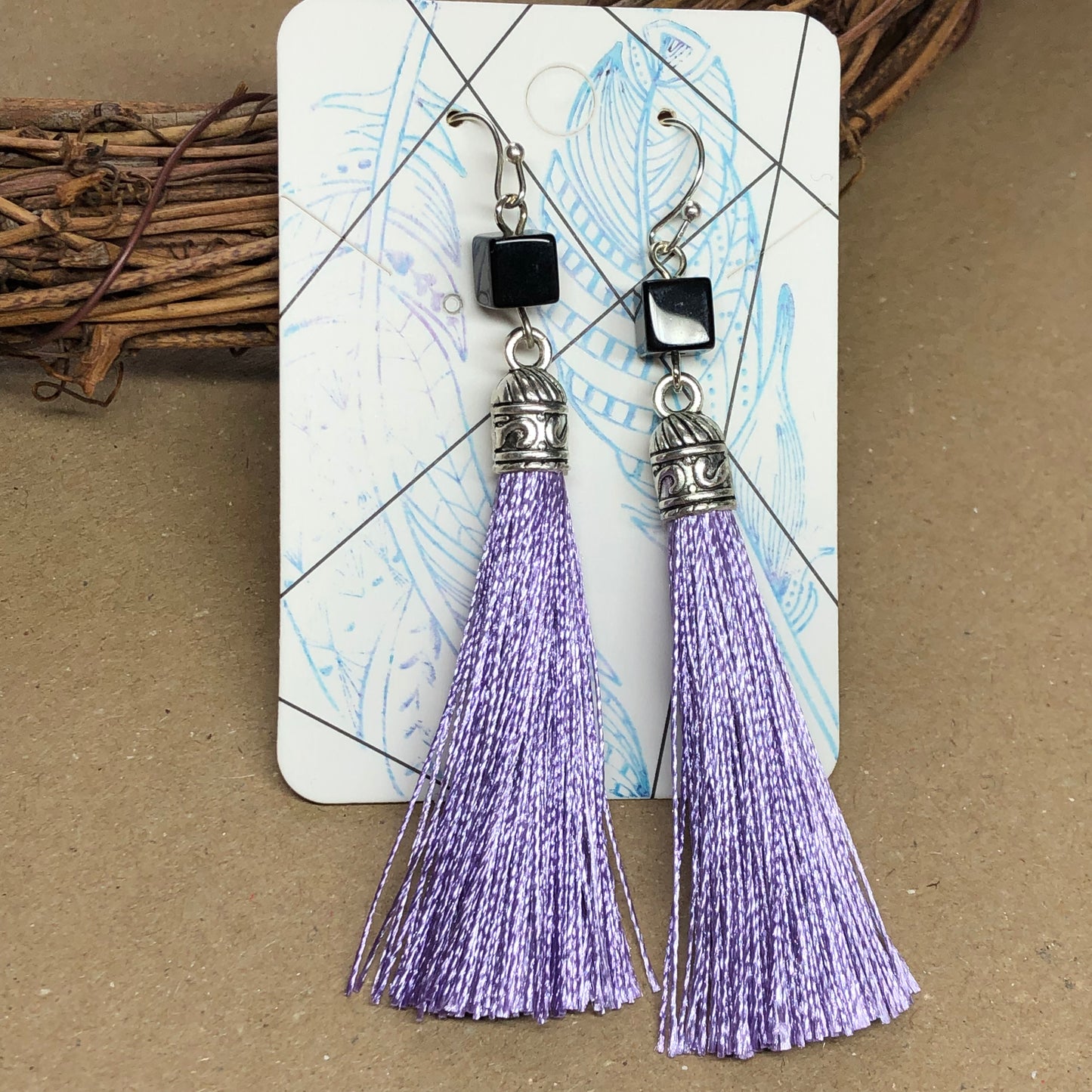 Lilac tassel earrings with black cubes