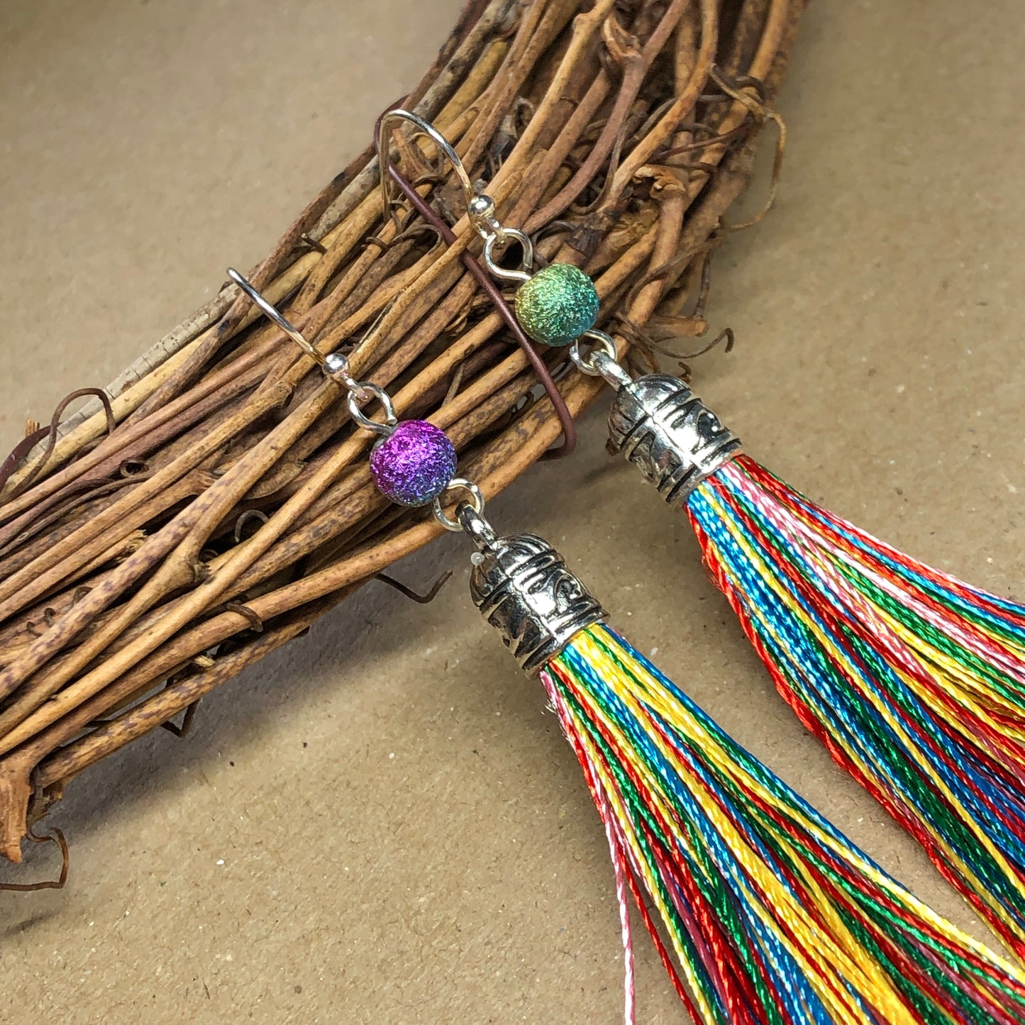 Rainbow tassel earrings with stardust beads