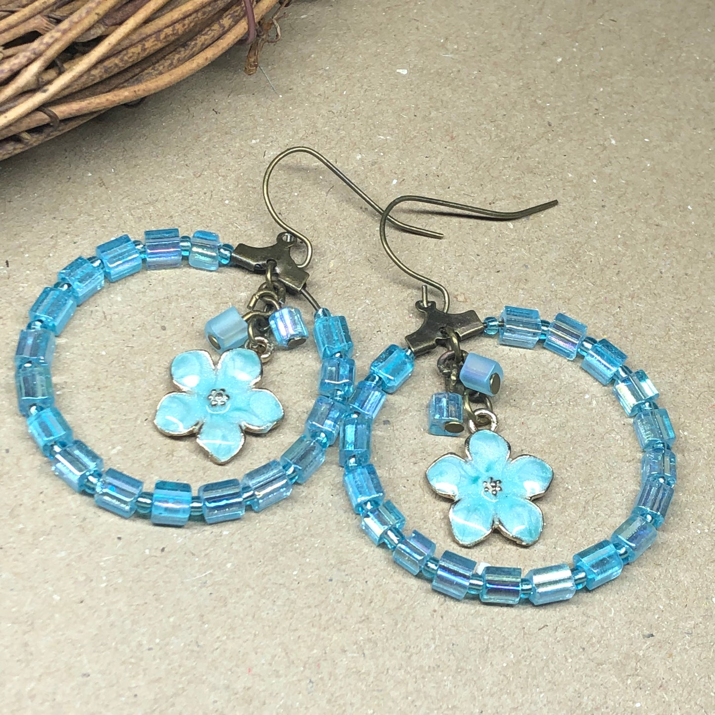 Blue hoop flower charm earrings