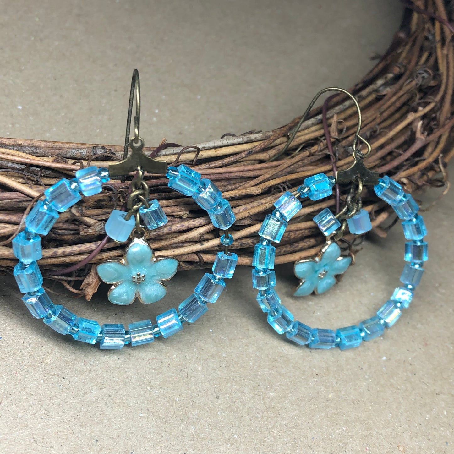 Blue hoop flower charm earrings