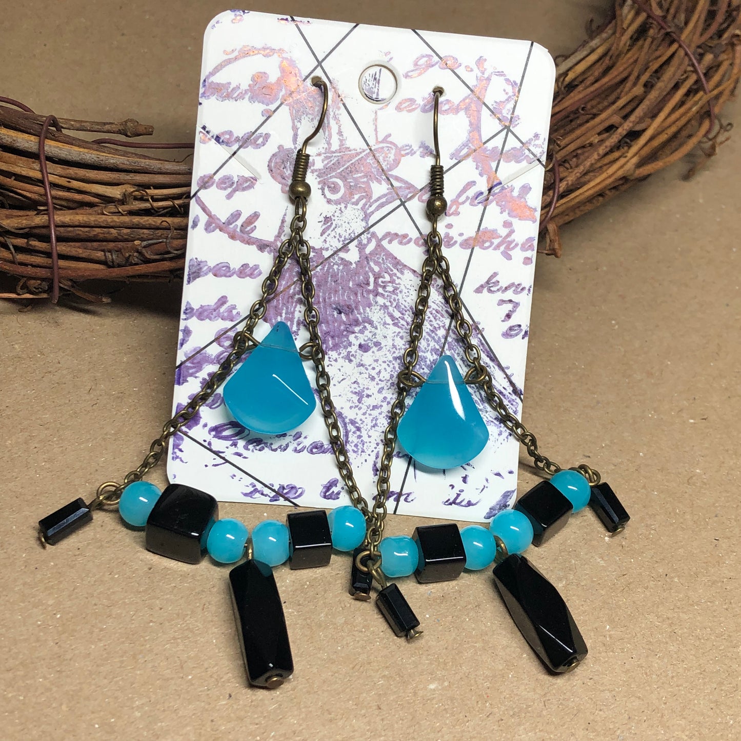 Long blue and black chandelier earrings