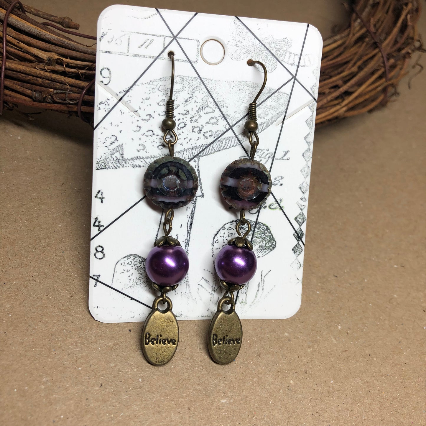 Purple glass believe earrings