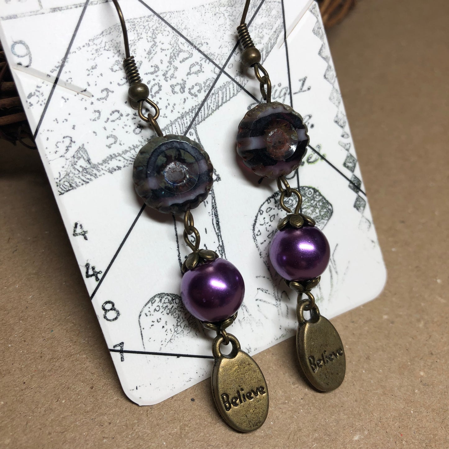 Purple glass believe earrings