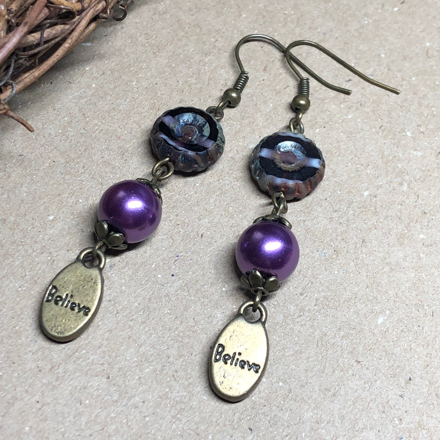 Purple glass believe earrings