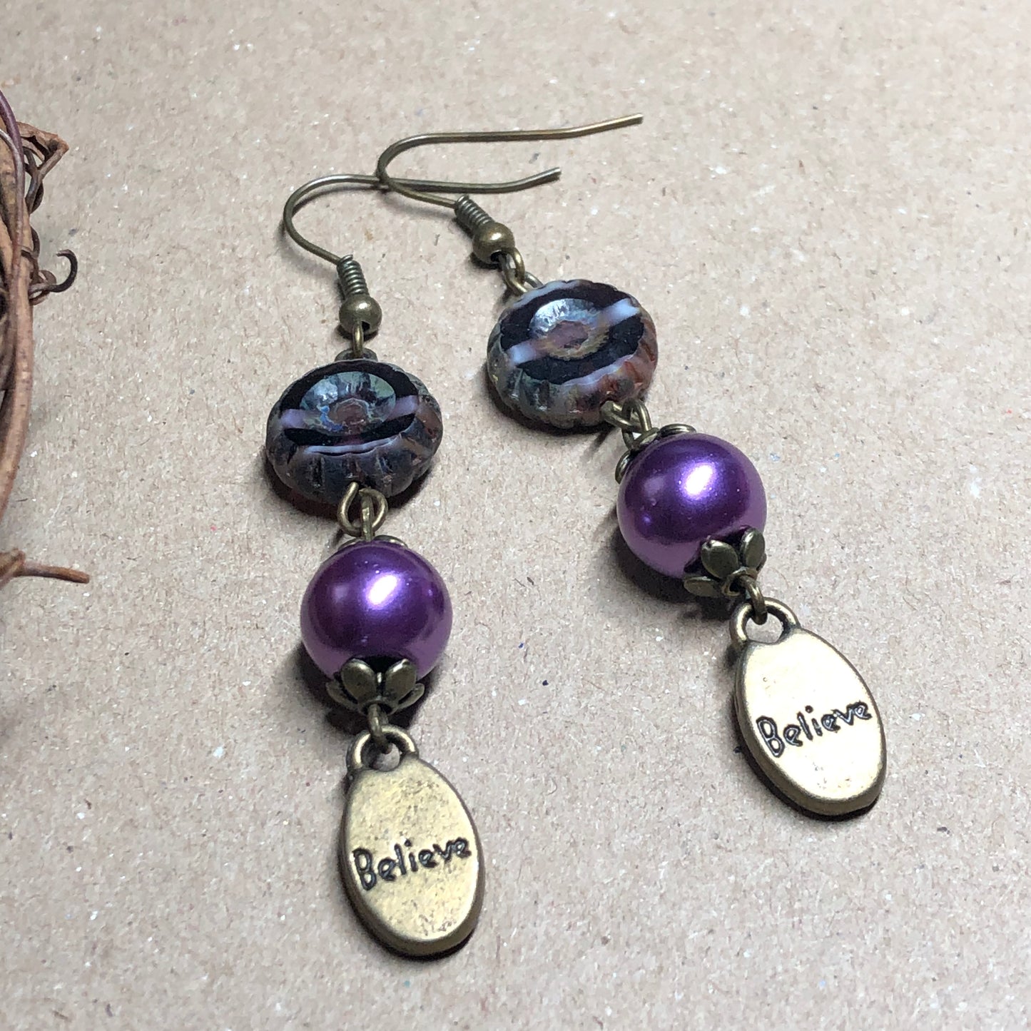 Purple glass believe earrings