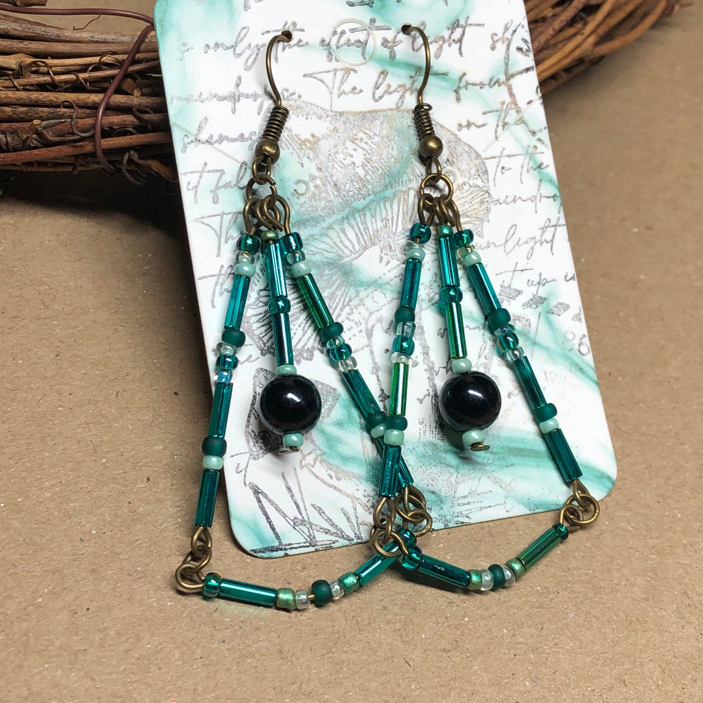 Long teal glass chandelier earrings