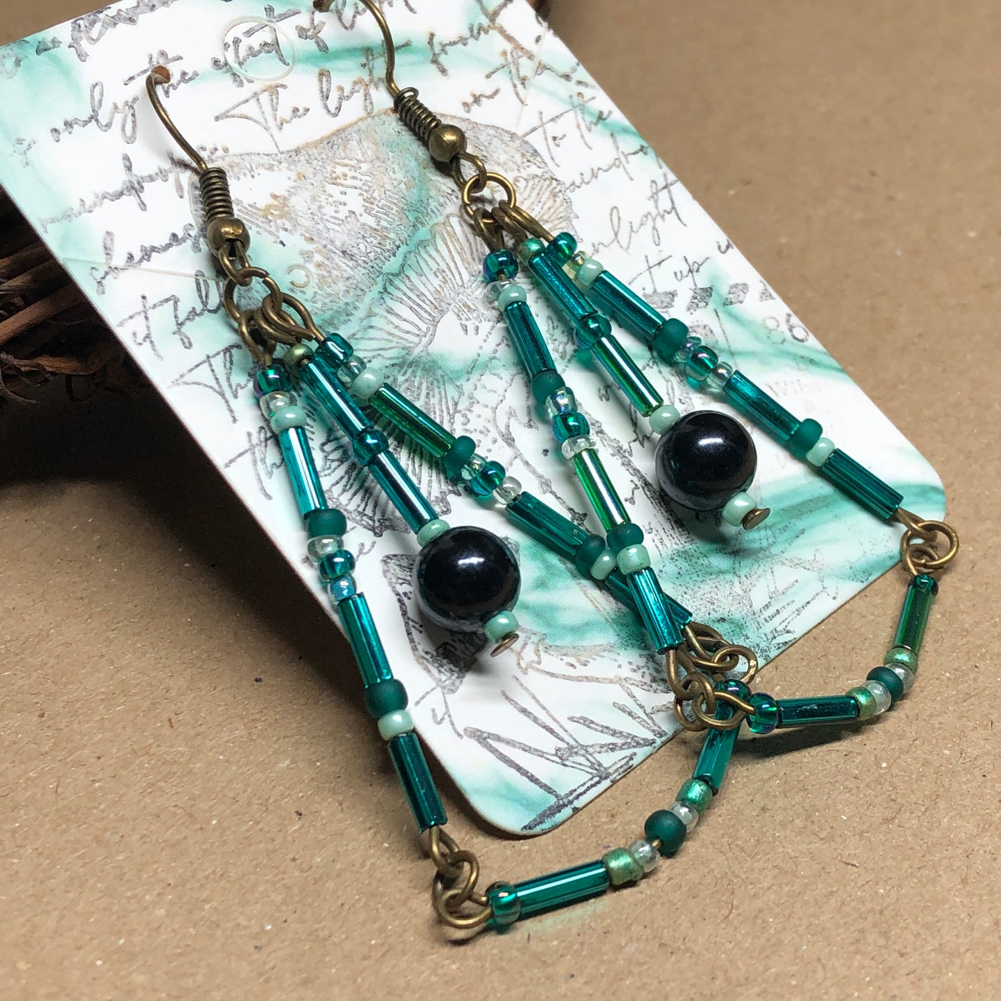 Long teal glass chandelier earrings