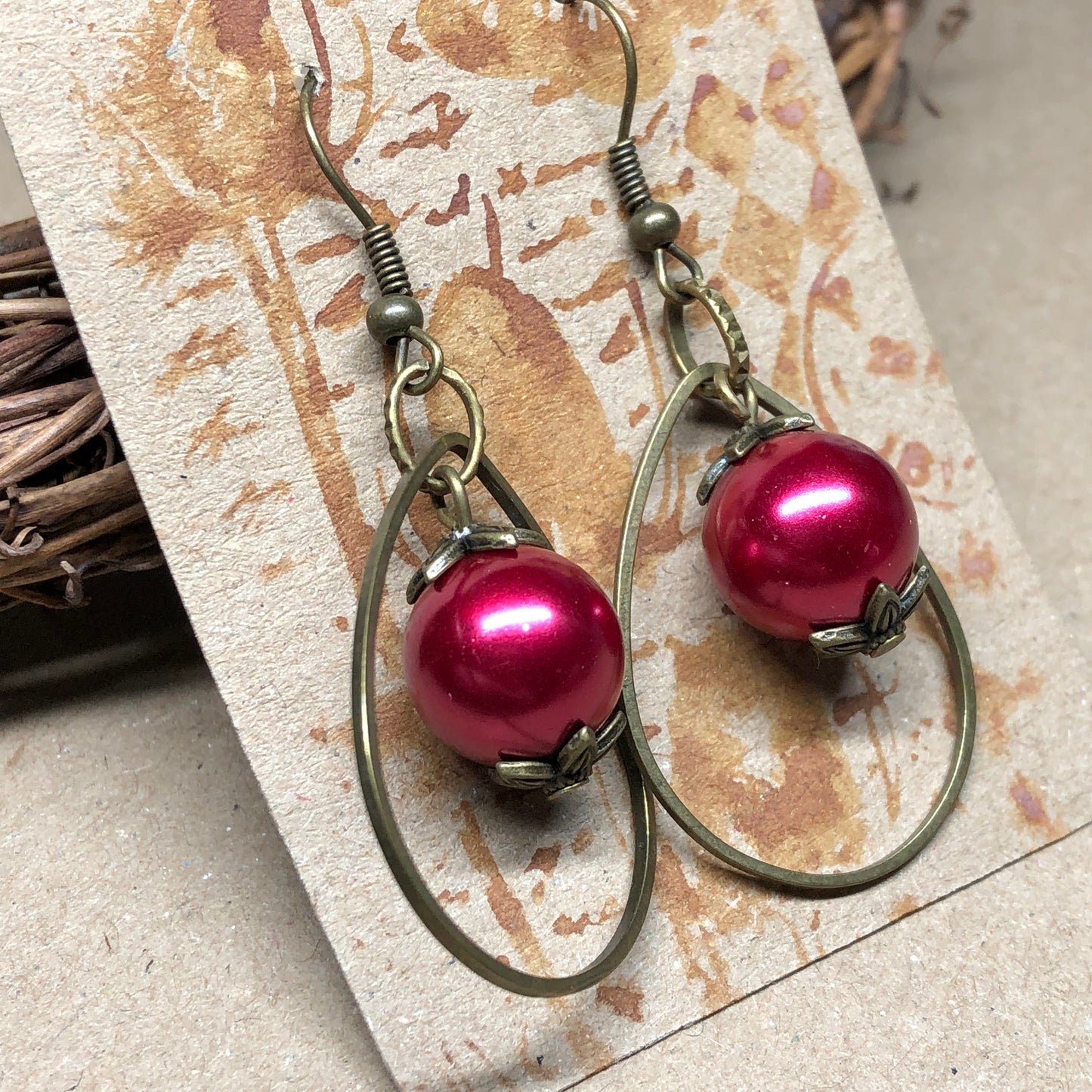 Red pearl bronze hoop earrings