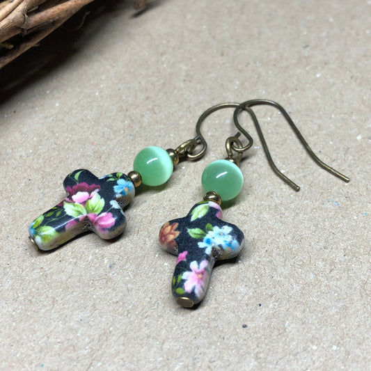 Green cats eye floral cross earrings