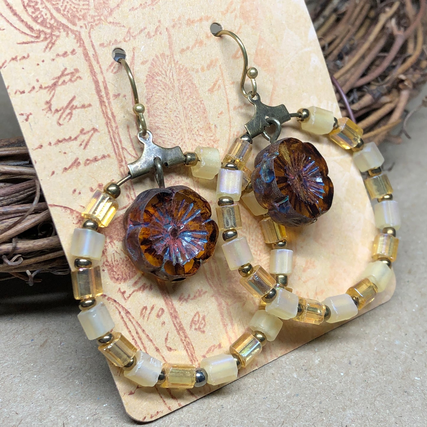 Yellow glass hoop earrings with Amber Czech glass flowers