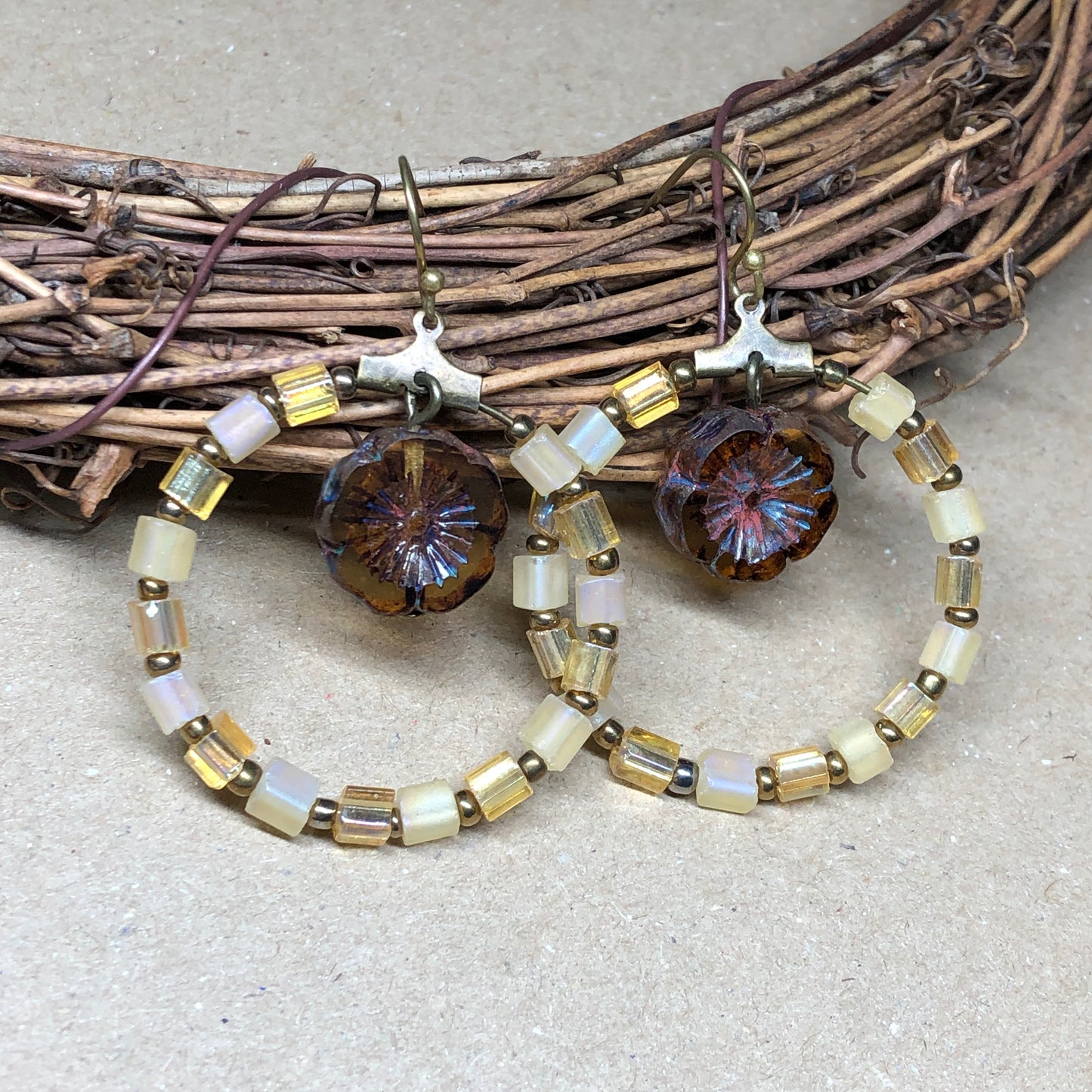 Yellow glass hoop earrings with Amber Czech glass flowers