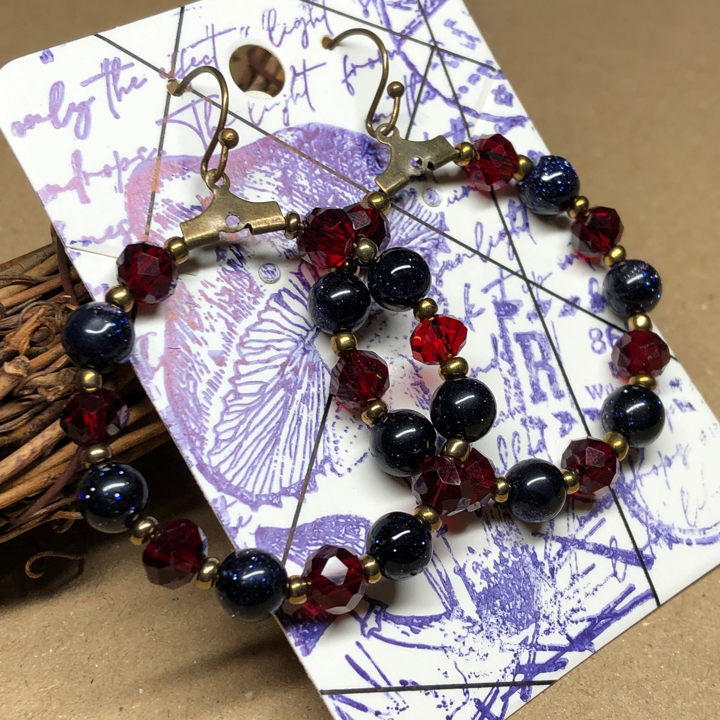 Goldstone and red crystal hoop earrings