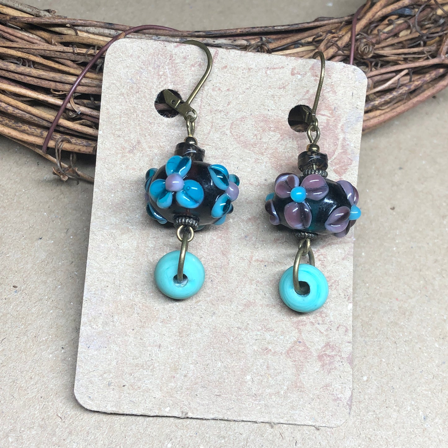 Purple floral lampwork bead earrings