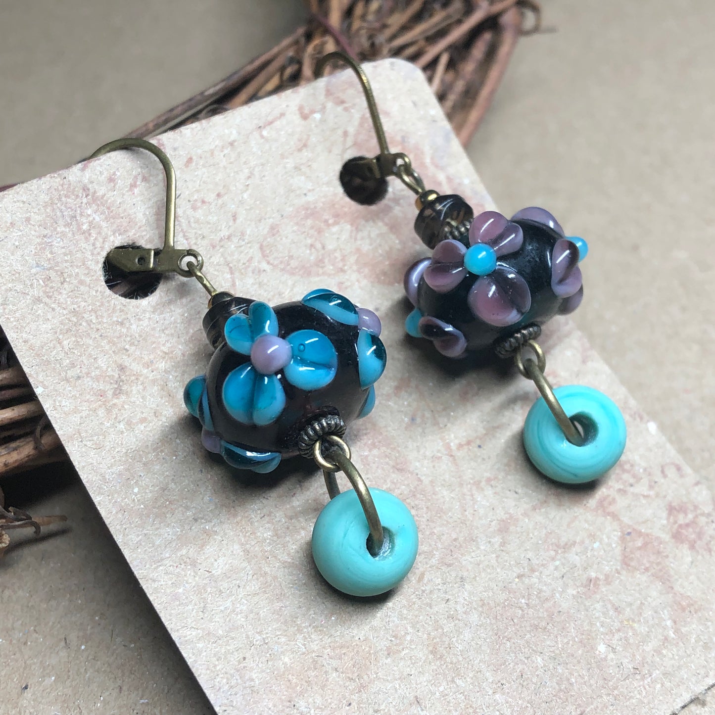 Purple floral lampwork bead earrings