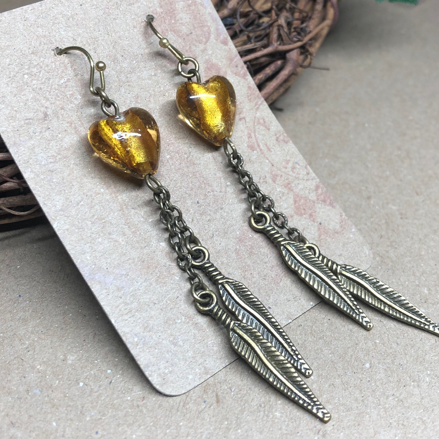 Golden honey Murano heart feather earrings