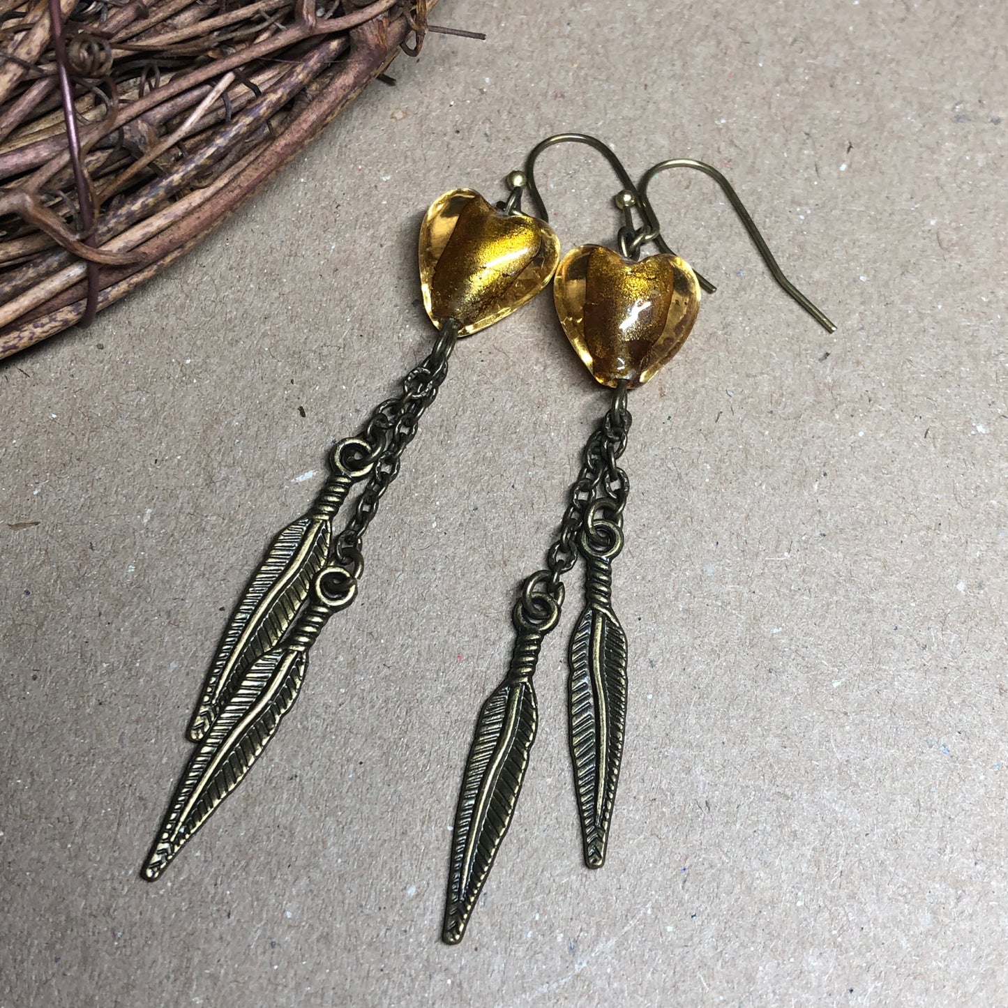 Golden honey Murano heart feather earrings