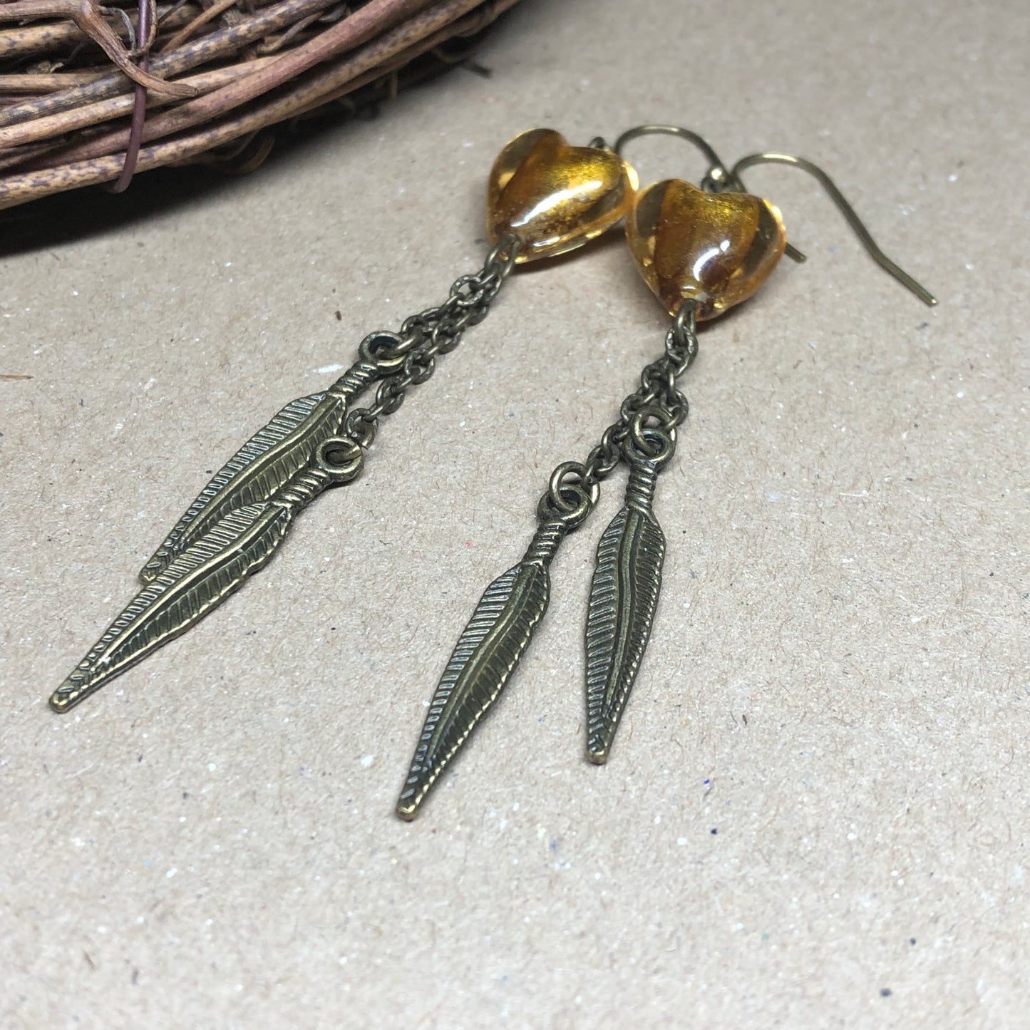 Golden honey Murano heart feather earrings