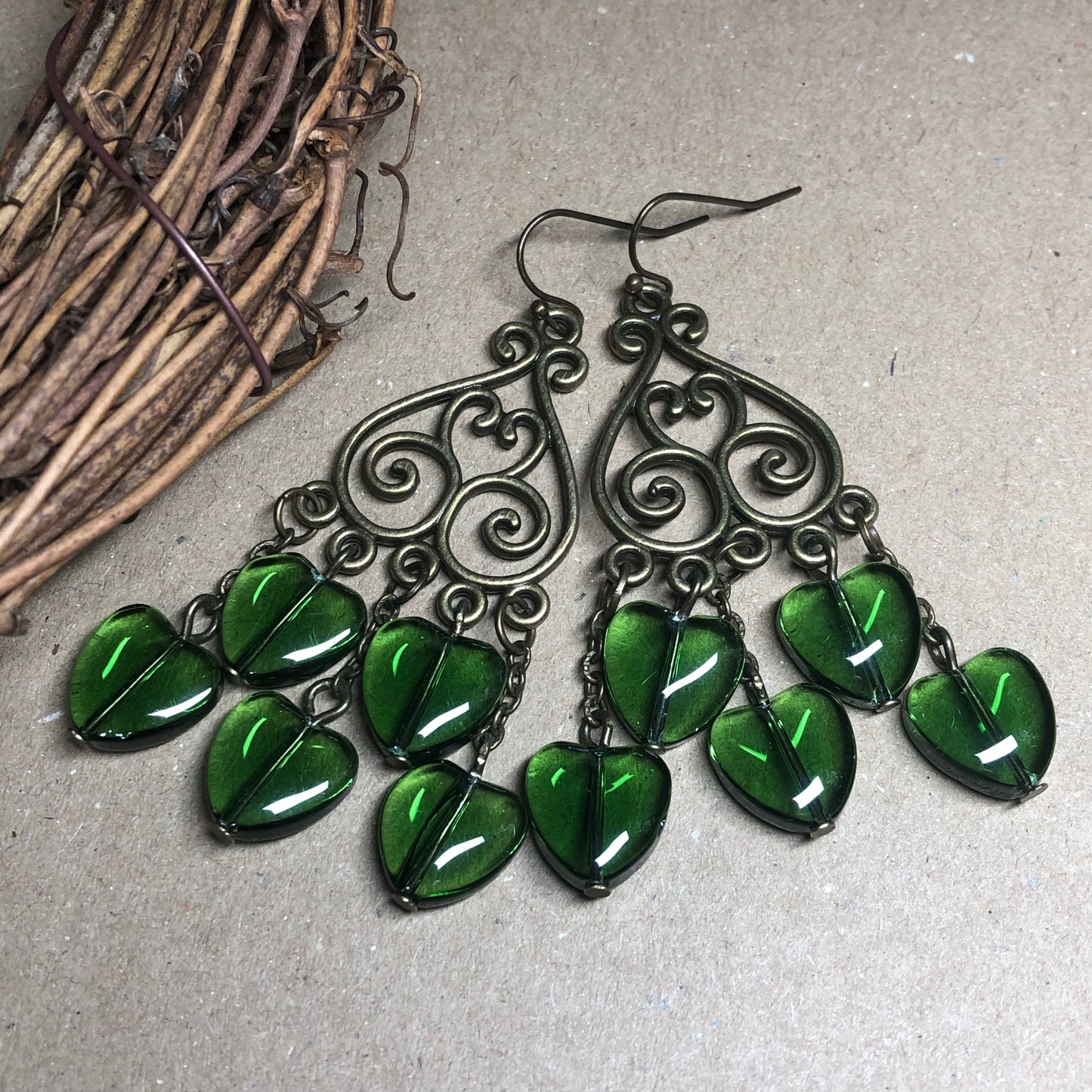 Green glass heart chandelier earrings