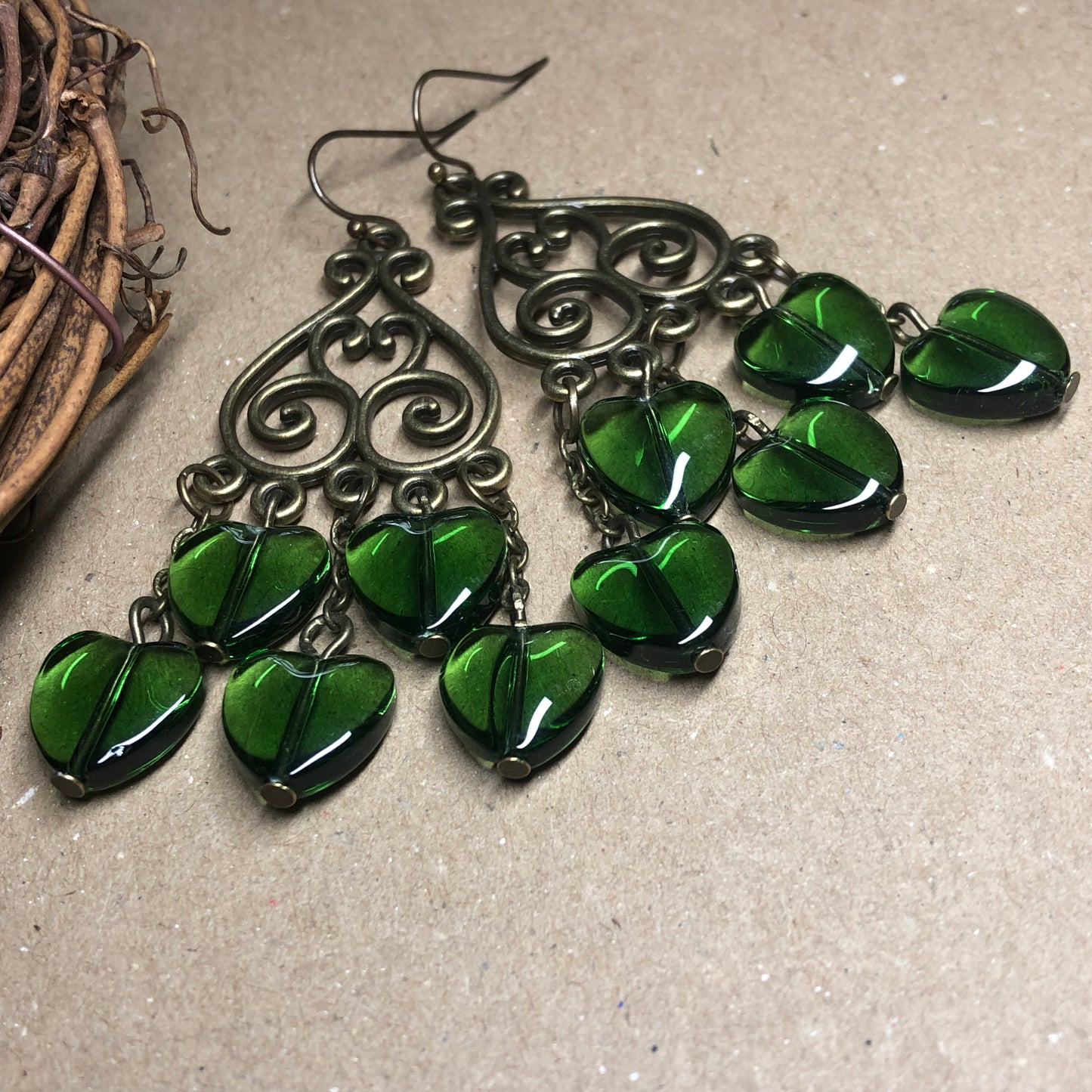 Green glass heart chandelier earrings