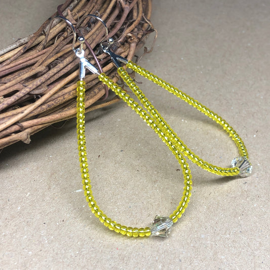 Bright yellow glass peardrop hoop earrings