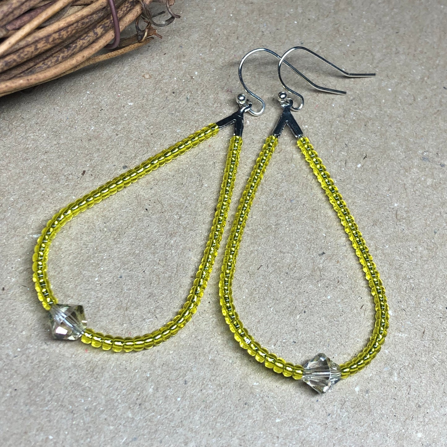 Bright yellow glass peardrop hoop earrings