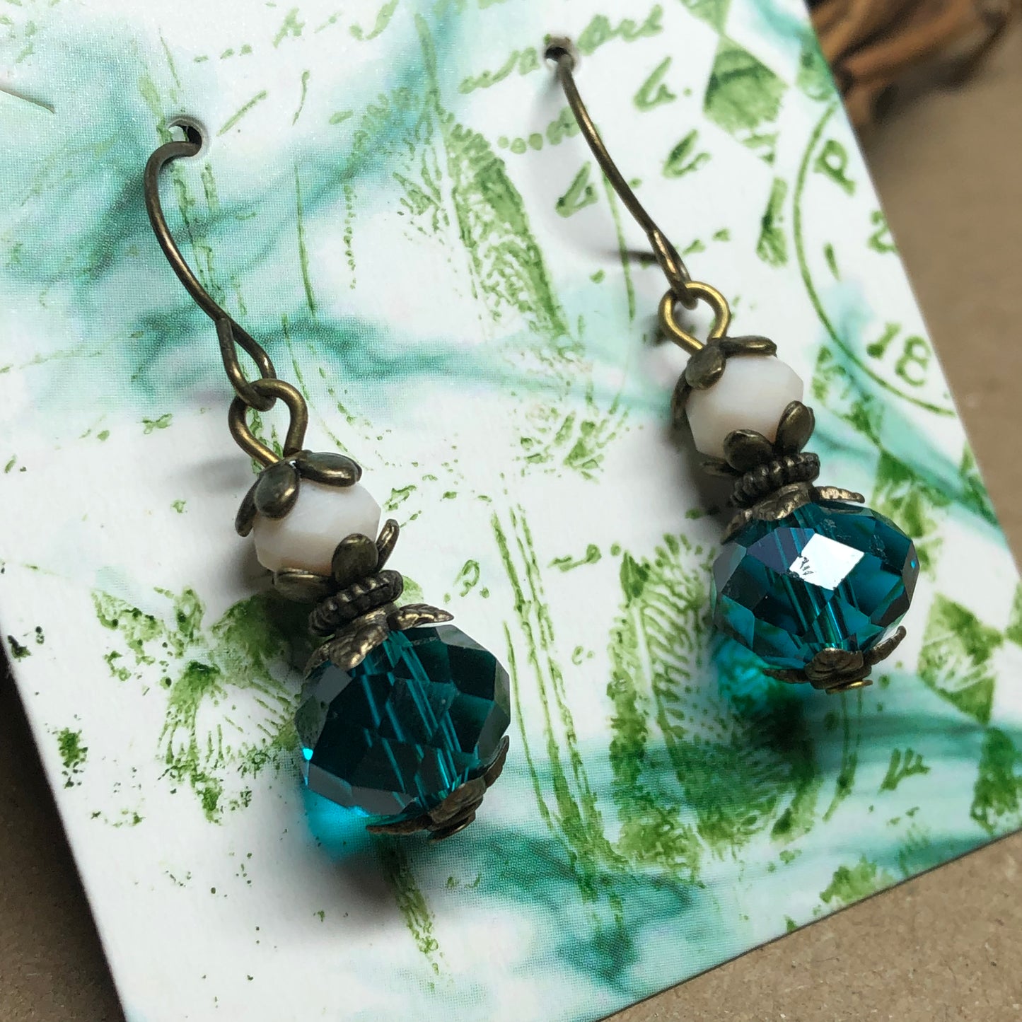 Cream and teal faceted crystal earrings