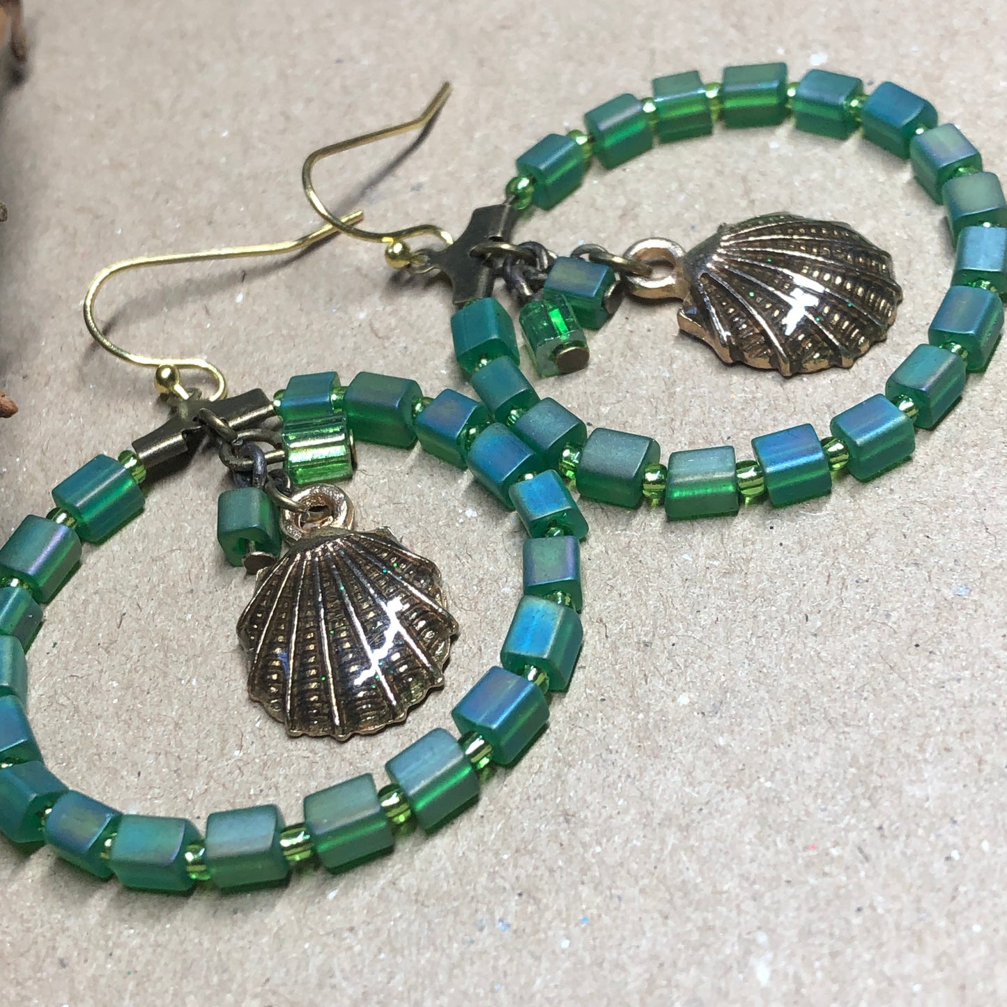 Green glass seashell charm bronze hoop earrings