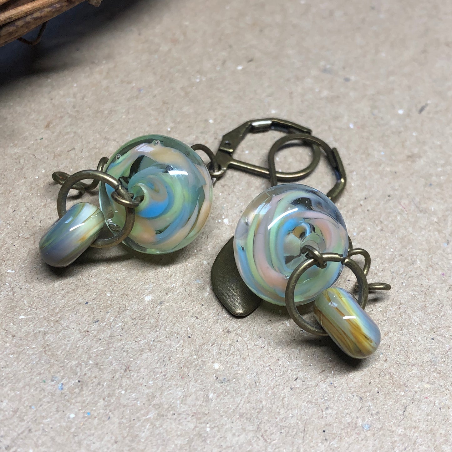 Green stripe lampwork bead earrings